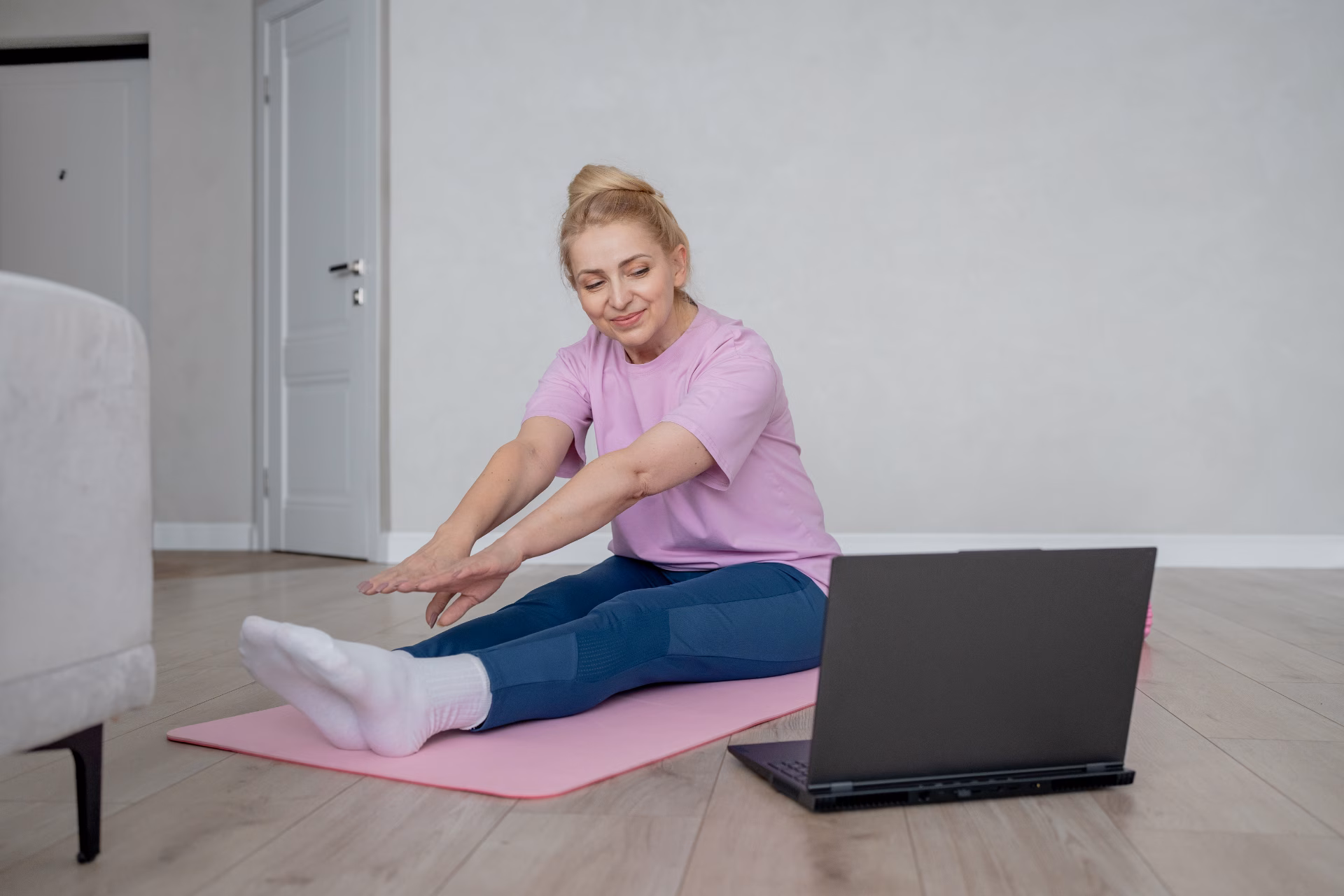 a woman is engaging in an online home exercise and 2024 12 07 23 24 10 utc converted